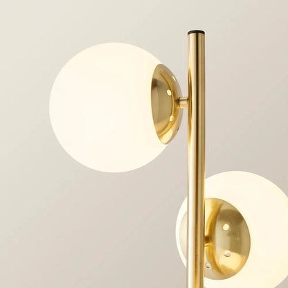 Jas Modern Gold Floor Lamp with Frosted Glass Globe Shades